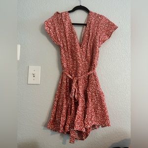 Super cute floral romper. Size M. Brand new with tags.